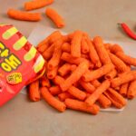 Botana de trigo sabor Sindandong Tteokbokki Picante Haitai 110g (24 pzs)